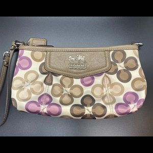 Coach tan and purple wristlet purse